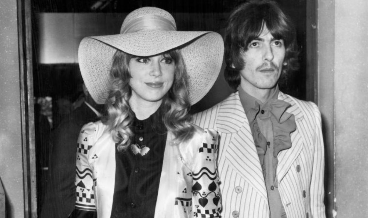 George Harrison and Pattie Boyd pictured in 1968. George Harrison, guitarist with The Beatles, married model Pattie Boyd in January 1966. The couple stayed together but divorced in 1977. They are pictured here at London Heathrow Airport, on their way to The Cannes Film Festival in France. Picture taken circa 15th May 1968 