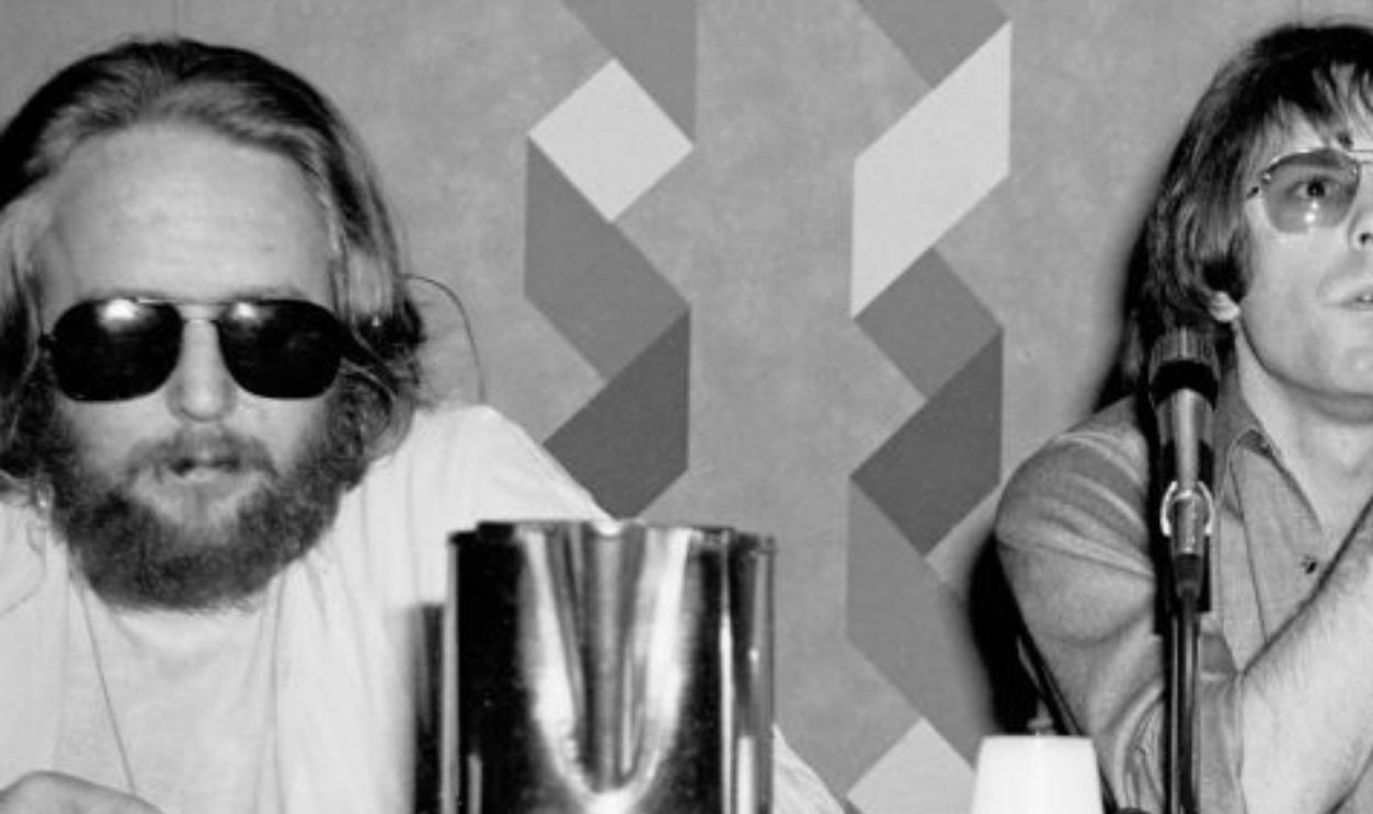 View, from left, of American Rock musicians Keith Godchaux (1948 - 1980), Bob Weir, and Phil Lesh, all of the group Grateful Dead, during a press conference at the NY Hilton Hotel, New York, New York, January 9, 1979. The press conference, held for college media only, took place between the band's appearances at Madison Square Garden and Nassau Coliseum. 