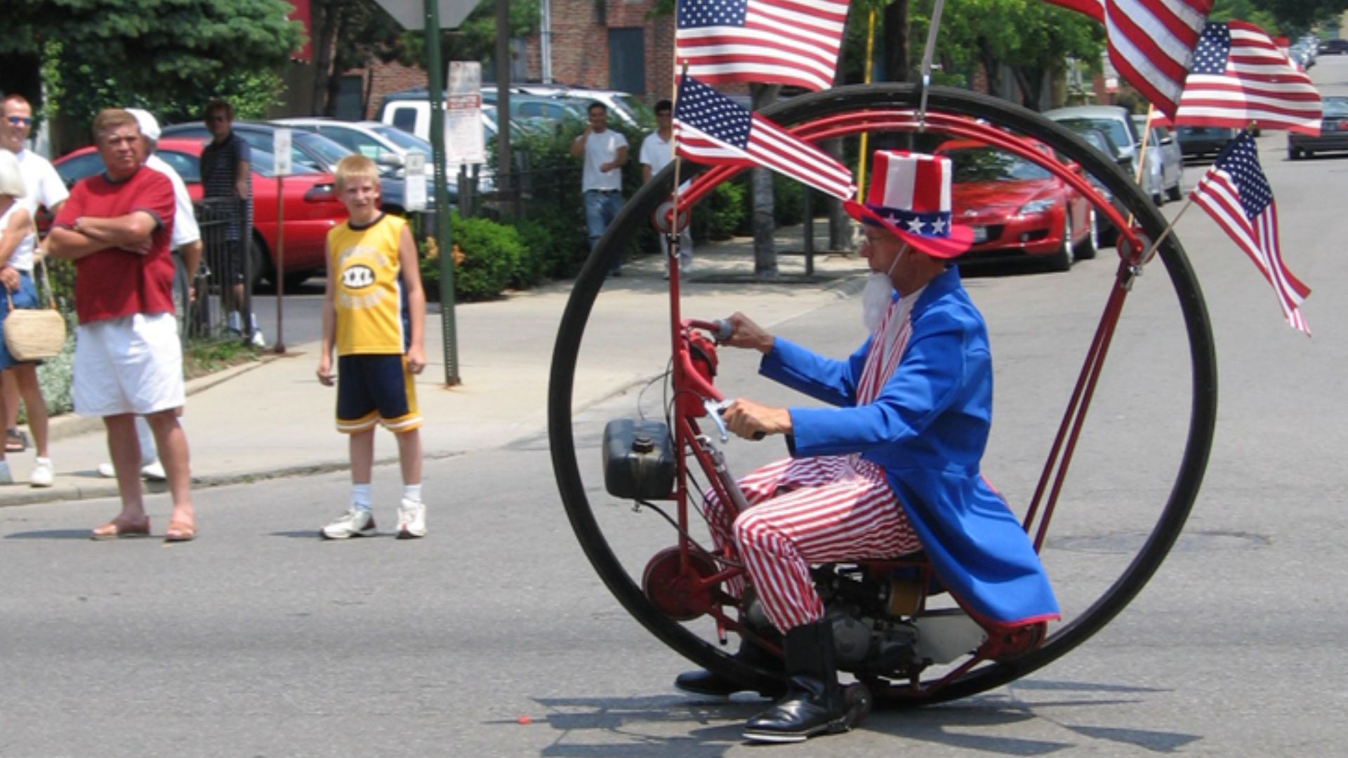 A participant in the 2005 Doodah Parade in Columbus, Ohio rides a monowheel.