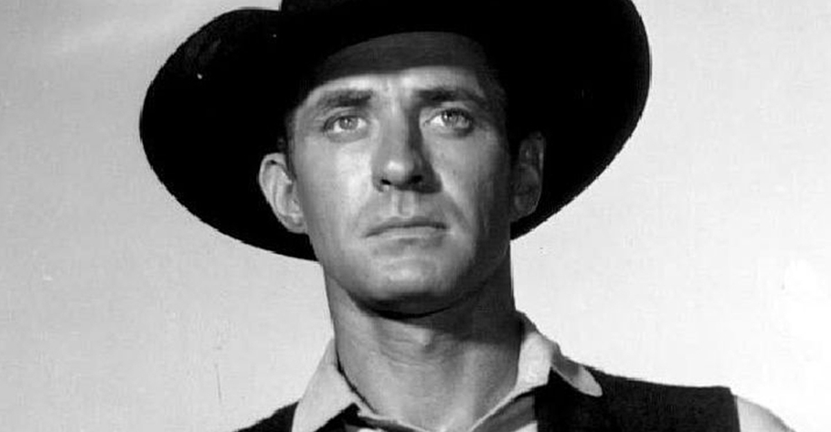 Portrait of Jock Mahoney wearing a cowboy hat.
