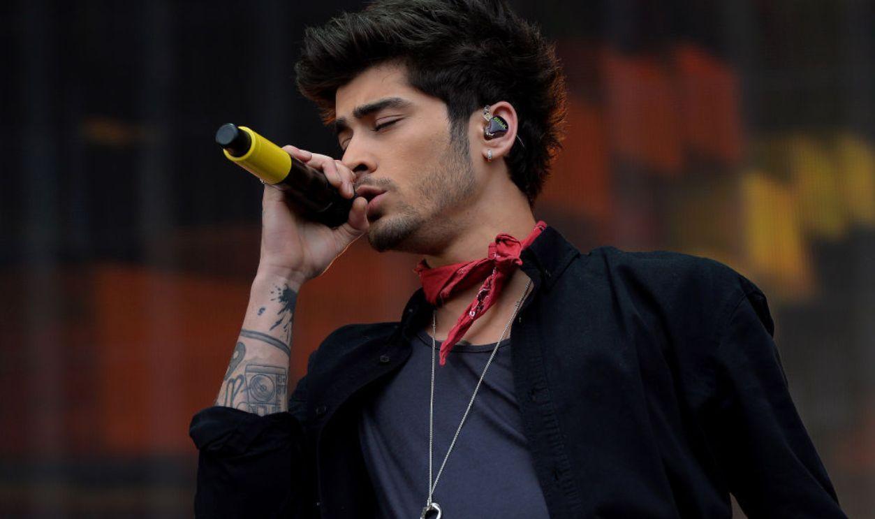 Zayn Malik of One Direction performing on stage during Radio1's Big Weekend at Glasgow Green in Glasgow. 