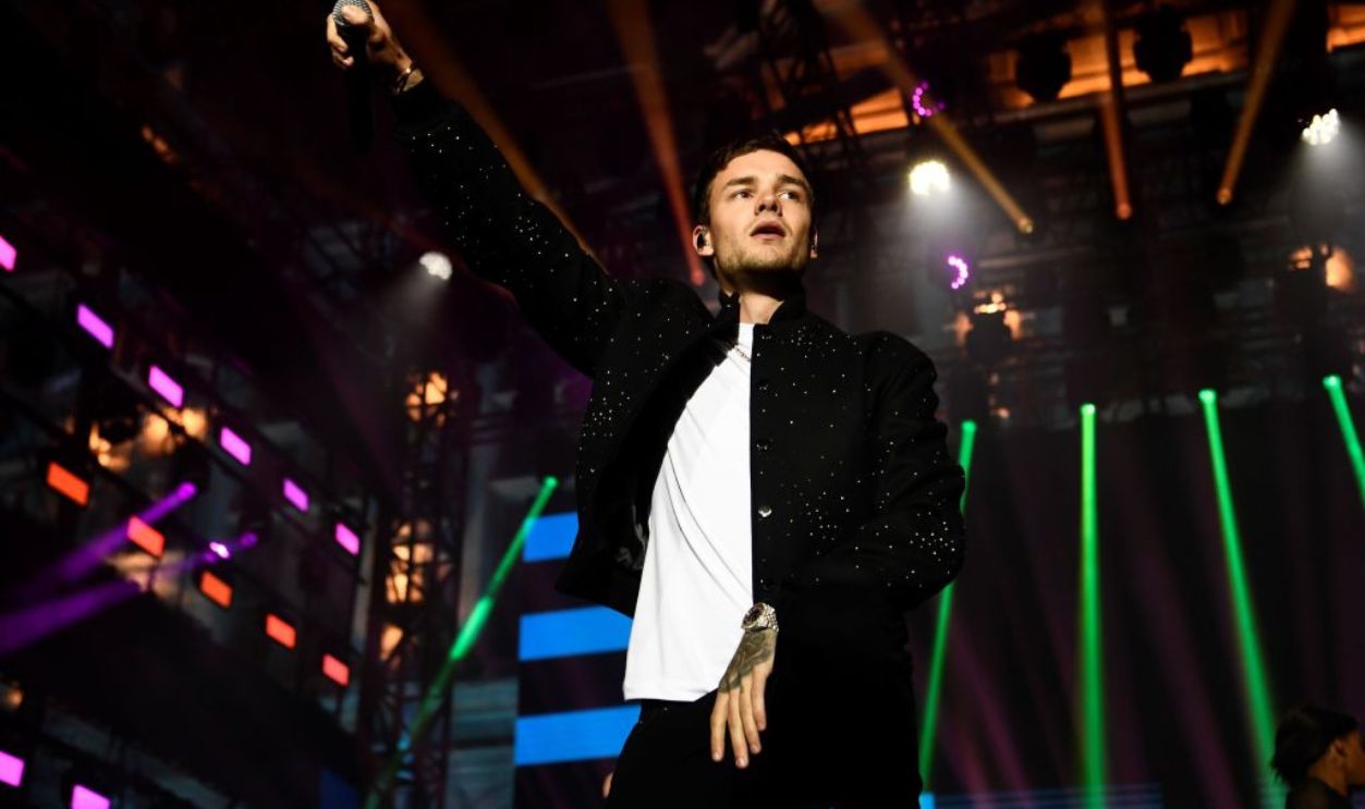 Britain singer Liam Payne performs on stage during a concert in front of the Hotel de Ville in Paris on September 15, 2017 to celebrate Paris' coronation as host of the 2024 Olympics Games. Paris and Los Angeles celebrated their coronation as host cities for the 2024 and 2028 Olympics, delivering a jolt of good news for the International Olympic Committee as it battles escalating corruption allegations. In a drama-free conclusion to a three-year bidding race, IOC members voted unanimously to rubber-stamp a deal hashed out in July for Paris to be given 2024 and Los Angeles 2028. 