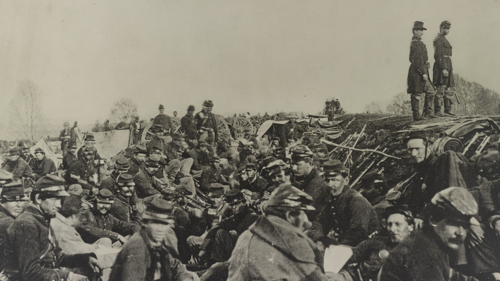 Title: Union soldiers entrenched along the west bank of the Rappahannock River at Fredericksburg, Virginia
Physical description: 1 photographic print on card mount : gelatin silver.

Notes: Formerly misidentified with the title
