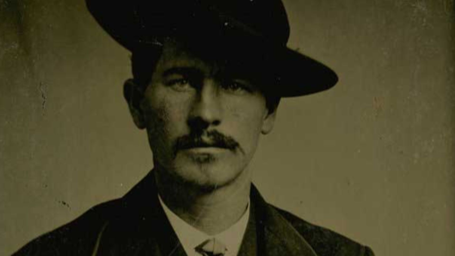 Wyatt Earp in the mid-1870s wearing a business suit.