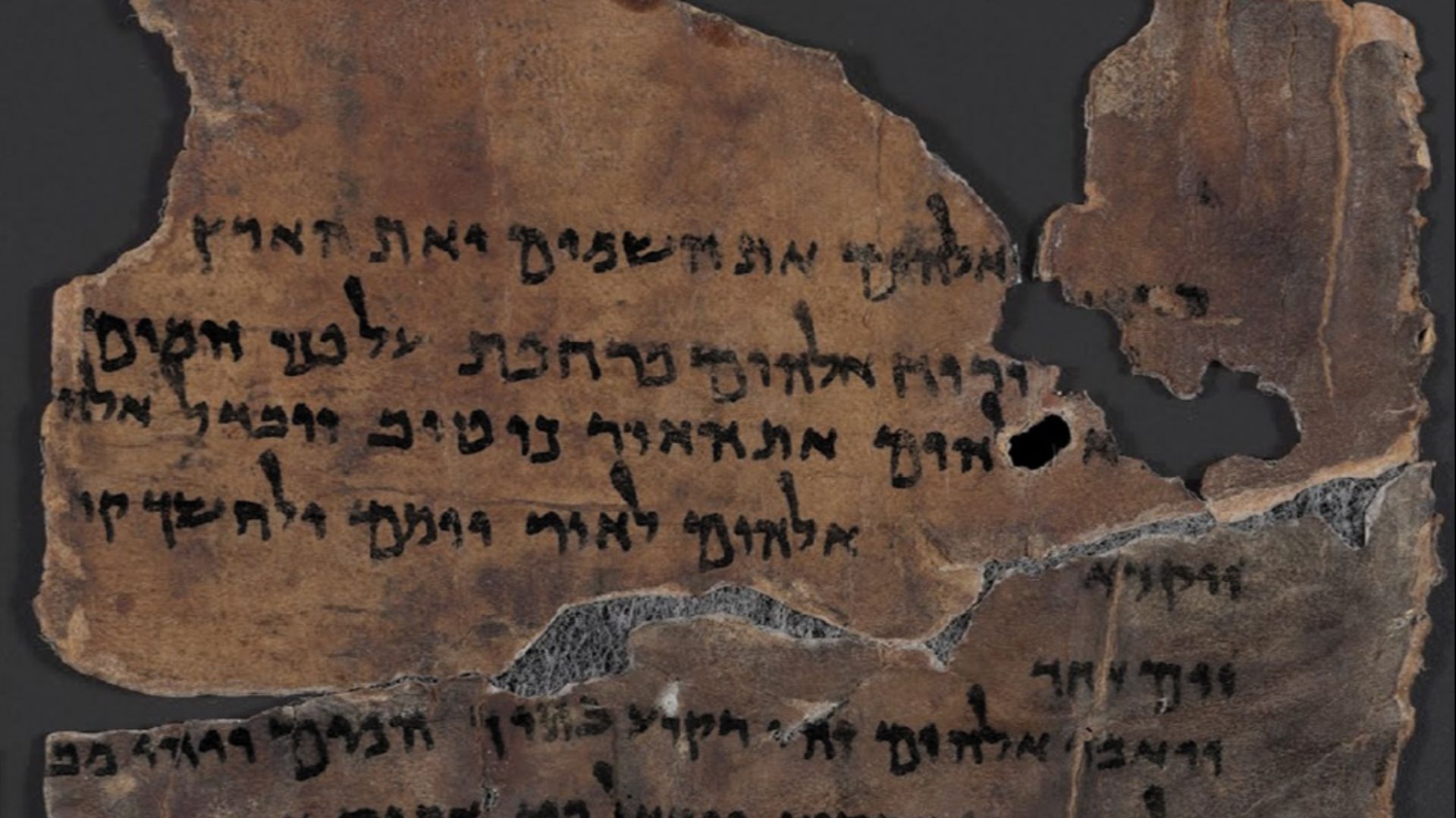 Cropped version of https://commons.wikimedia.org/wiki/File:Genesis_1_Dead_Sea_Scroll.jpg Dead Sea Scroll fragment 4Q7 with Genesis 1.