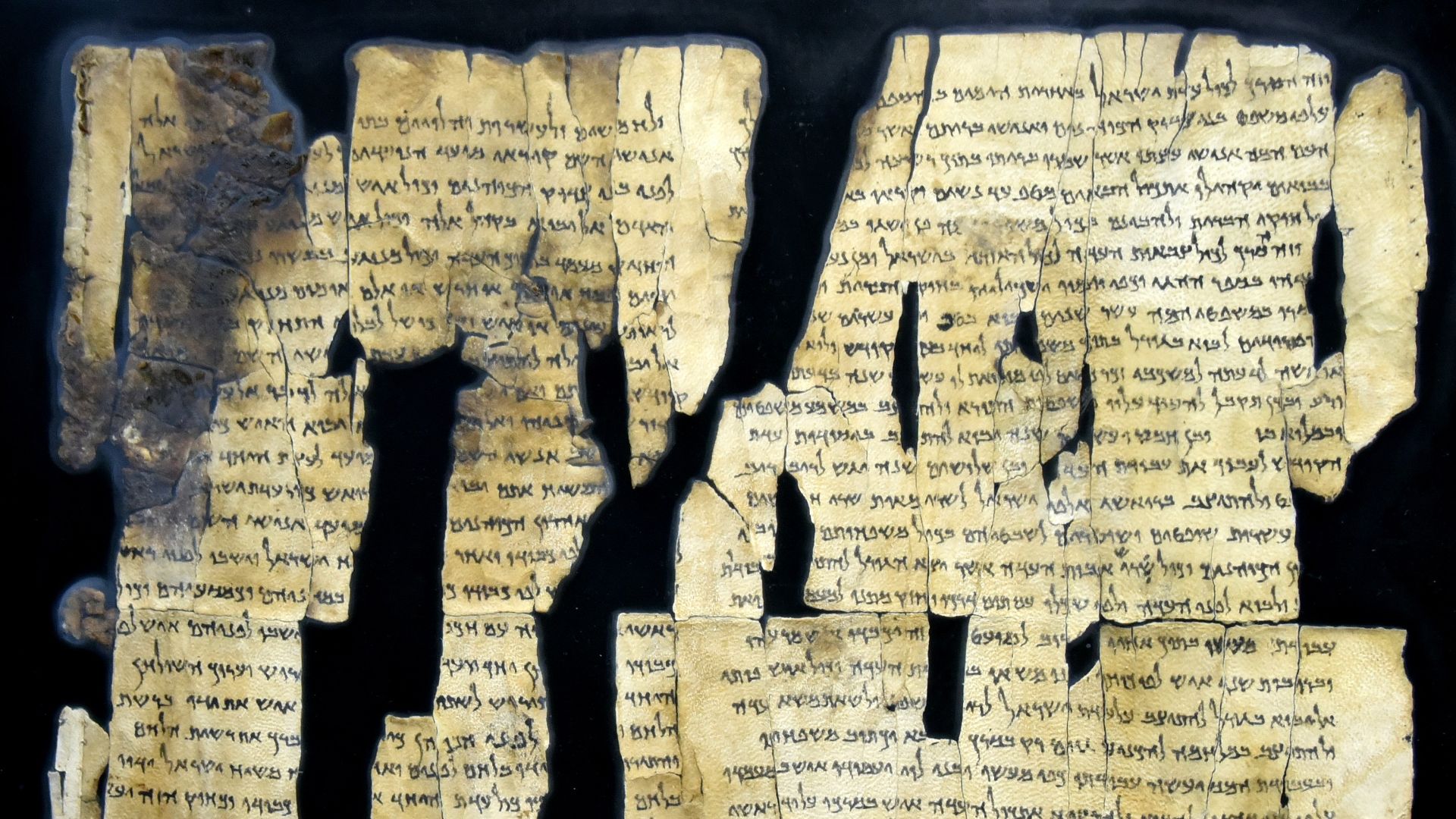 Dead Sea Scroll number 28a (1Q28a), from Qumran Cave 1; complete. From Qumran (Khirbet Qumran or Wadi Qumran), West Bank of the Jordan River, near the Dead Sea, modern-day State of Israel. On display at The Jordan Museum in Amman, the Hashemite Kingdom of