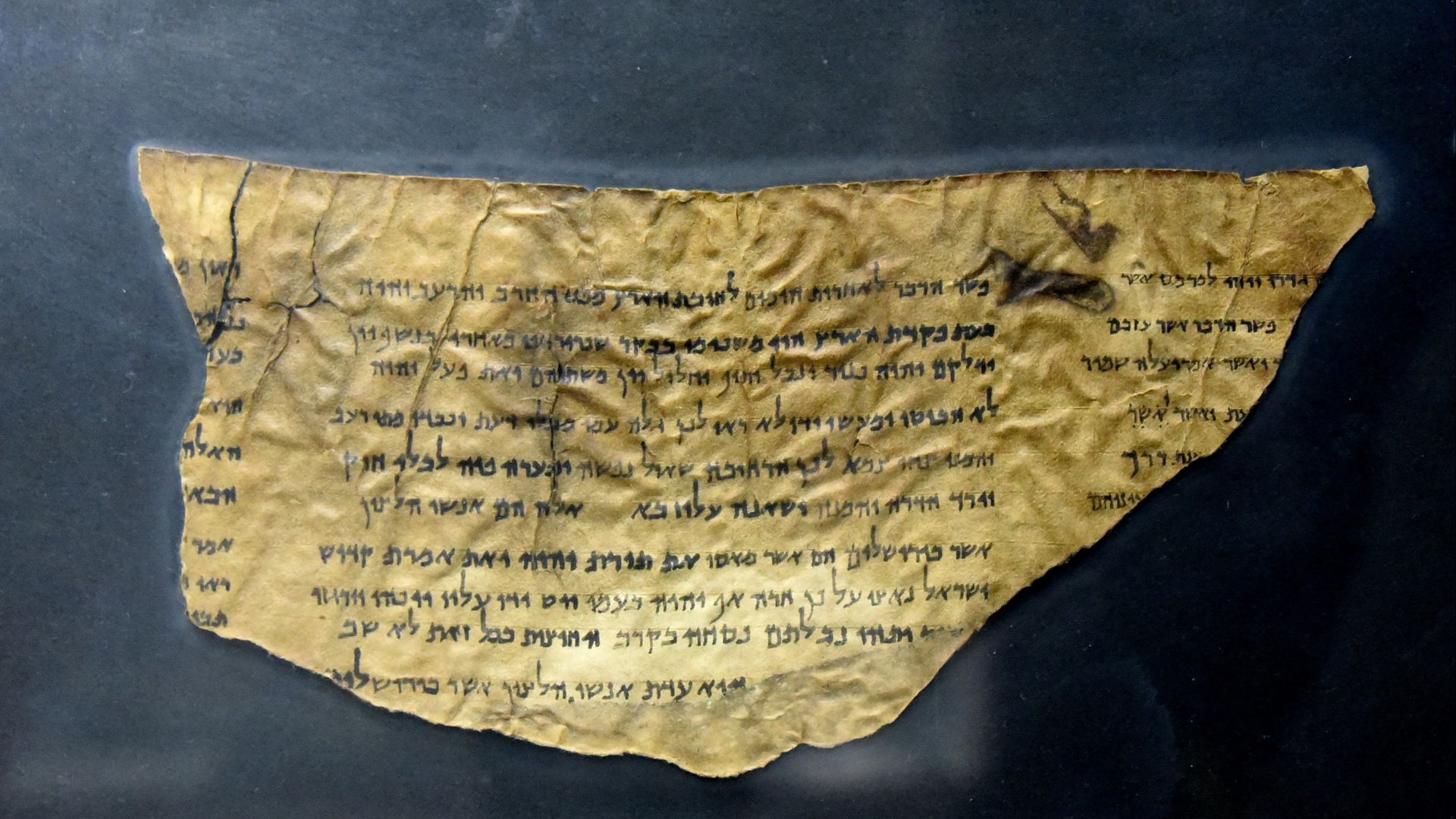 This is part of Dead Sea Scroll of Pesher Isaiah (4Q162), from Qumran Cave 4. From Qumran (Khirbet Qumran or Wadi Qumran), West Bank of the Jordan River, near the Dead Sea, modern-day State of Israel. The Jordan Museum, Amman, Jordan Hashimite Kingdom.