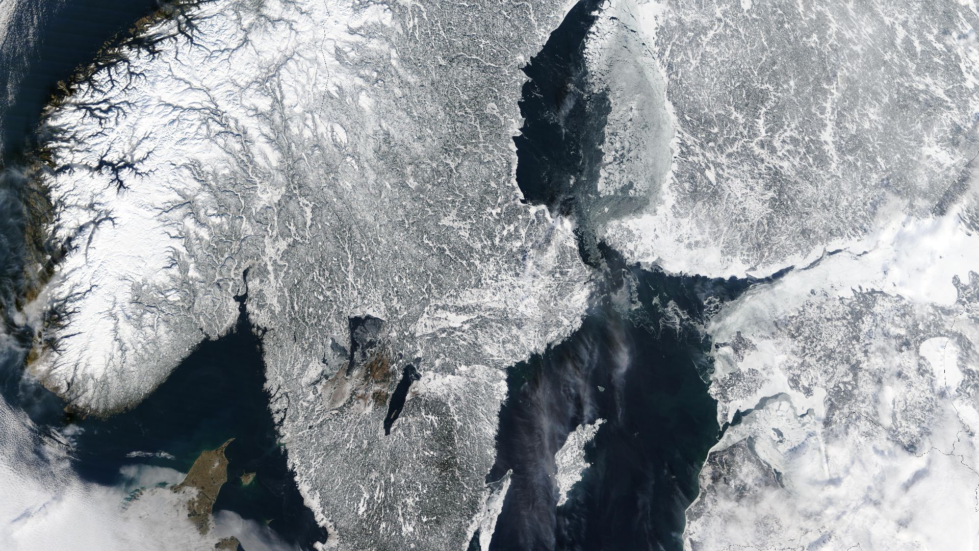 Scandinavia from space in winter.
The Moderate Resolution Imaging Spectroradiometer (MODIS) instrument aboard NASA’s Terra satellite captured the above image of the Scandinavian Peninsula on February 19, 2003.
With a landscape largely shaped by glaciers o