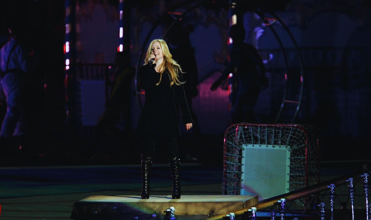 TURIN, ITALY - FEBRUARY 26: Canadian singer Avril Lavigne performs during the Closing Ceremony of the Turin 2006 Winter Olympic Games on February 26, 2006 at the Olympic Stadium in Turin, Italy.  (Photo by Clive Rose/Getty Images) 