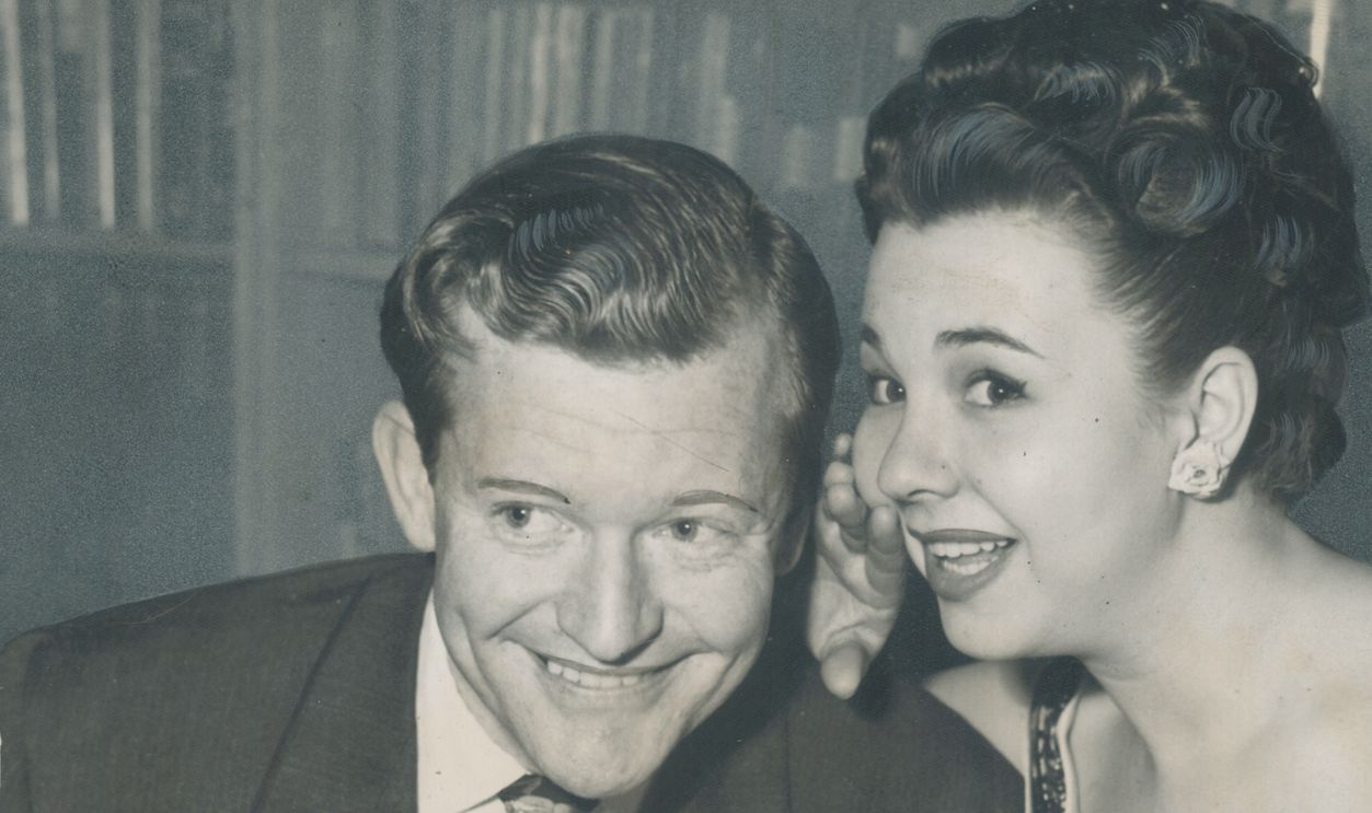 Gettyimages - 502543627, Still Honeymooning; Bill Moss; film producer; and his actress-bride Jane Withers; enjoy a spaghetti 