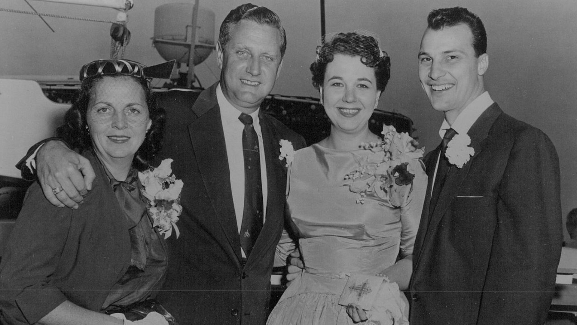 Press photo of Jane Withers and Kenneth Errair on 1955 wedding day with owners of the yacht on which the ceremony was held