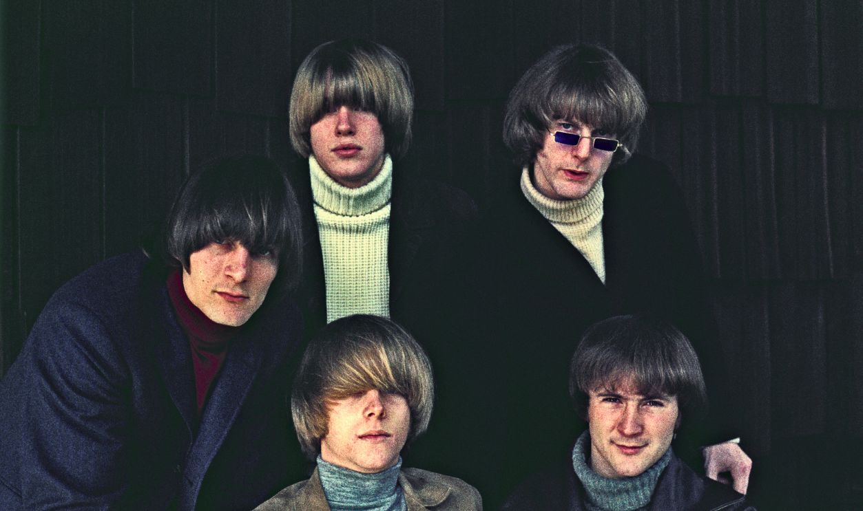 Folk rock group The Byrds (clockwise from top left) Michael Clarke, Jim (Roger) McGuinn, David Crosby, Chris Hillman and Gene Clark pose for a portrait circa 1965.
