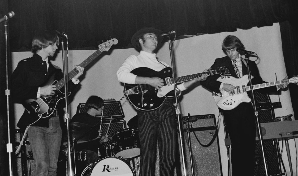 American rock band The Byrds in concert, circa 1965. From left to right they are bass player Chris Hillman, drummer Michael Clarke, guitarist David Crosby and frontman Jim McGuinn, later known as Roger McGuinn.