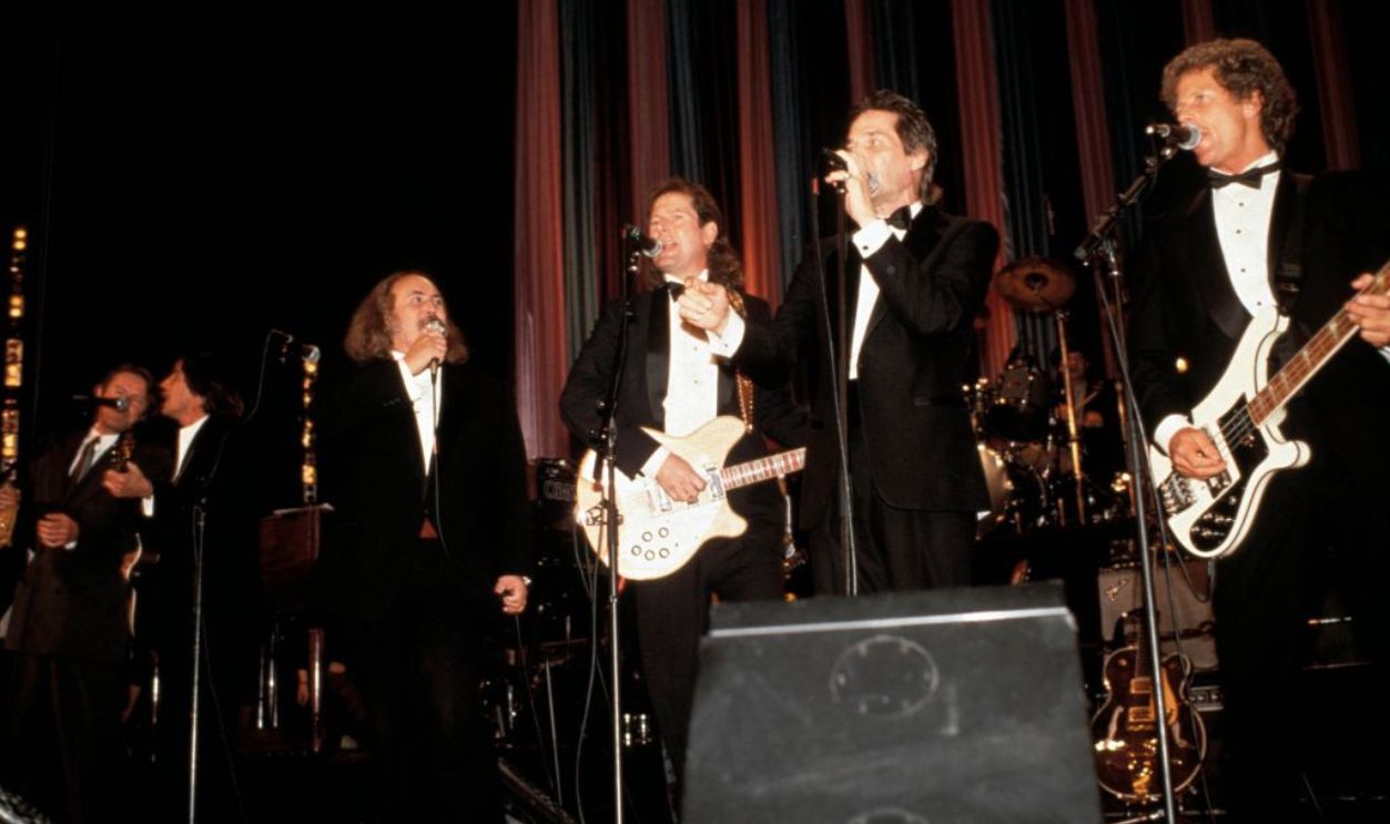 (MANDATORY CREDIT Ebet Roberts/Getty Images) UNITED STATES - JANUARY 16: ROCK 'N' ROLL HALL OF FAME Photo of Chris HILLMAN and BYRDS and David CROSBY and Roger McGUINN and Gene CLARK, L-R: ?, Jackson Browne (?), David Crosby, Roger McGuinn, Gene Clark, Chris Hillman performing at induction ceremony