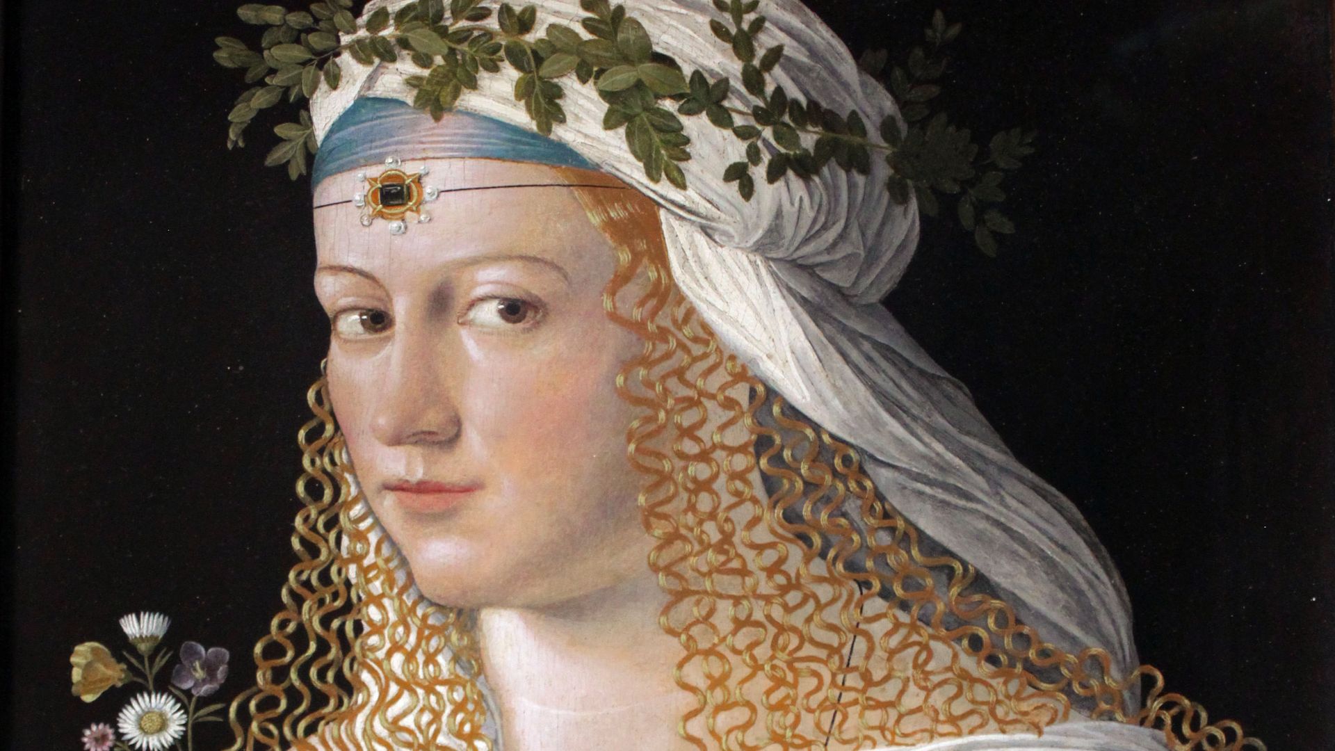 Traditionell gilt das Werk als Bildnis der Lucretia Borgia, Tochter von Papst Alexander VI.. Es zeigt eine unbekannte Dame in Gestalt der antiken Frühlingsgöttin Flora.