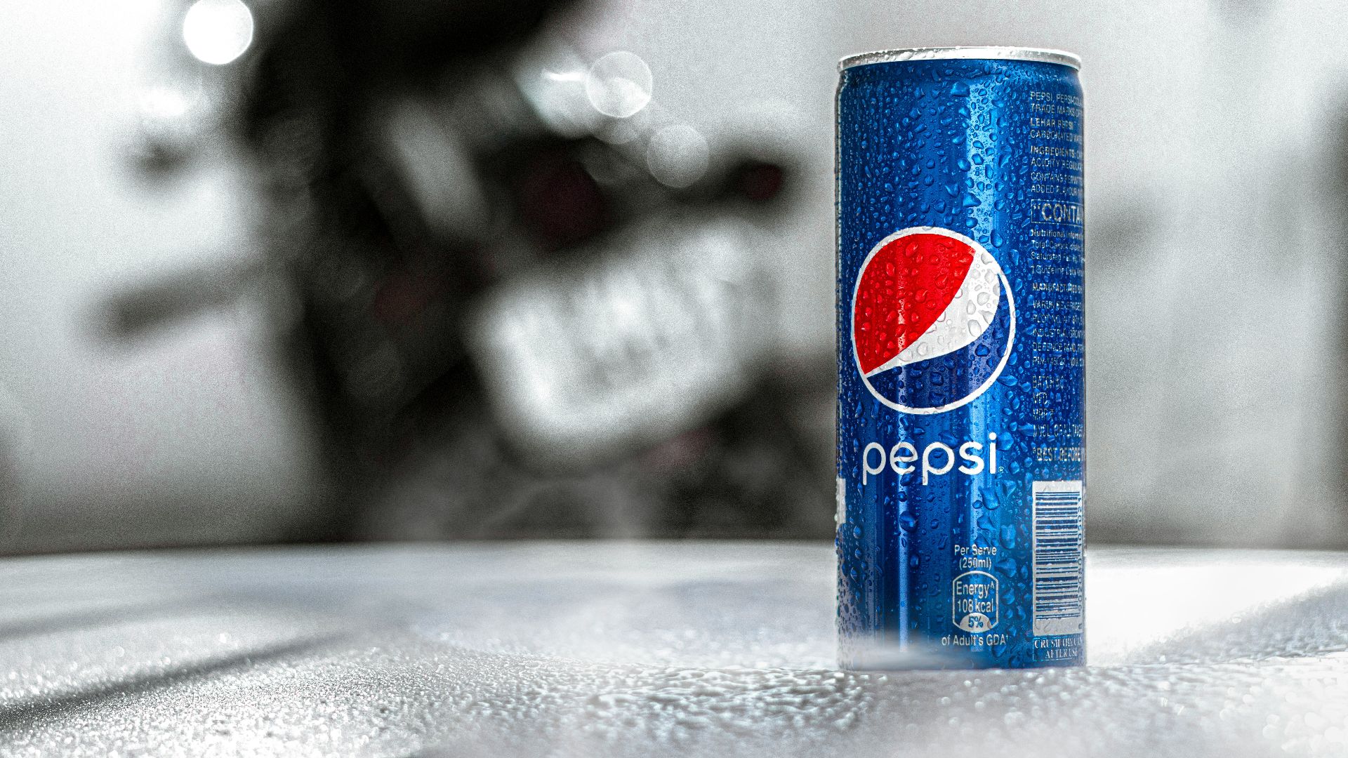 pepsi can on gray table