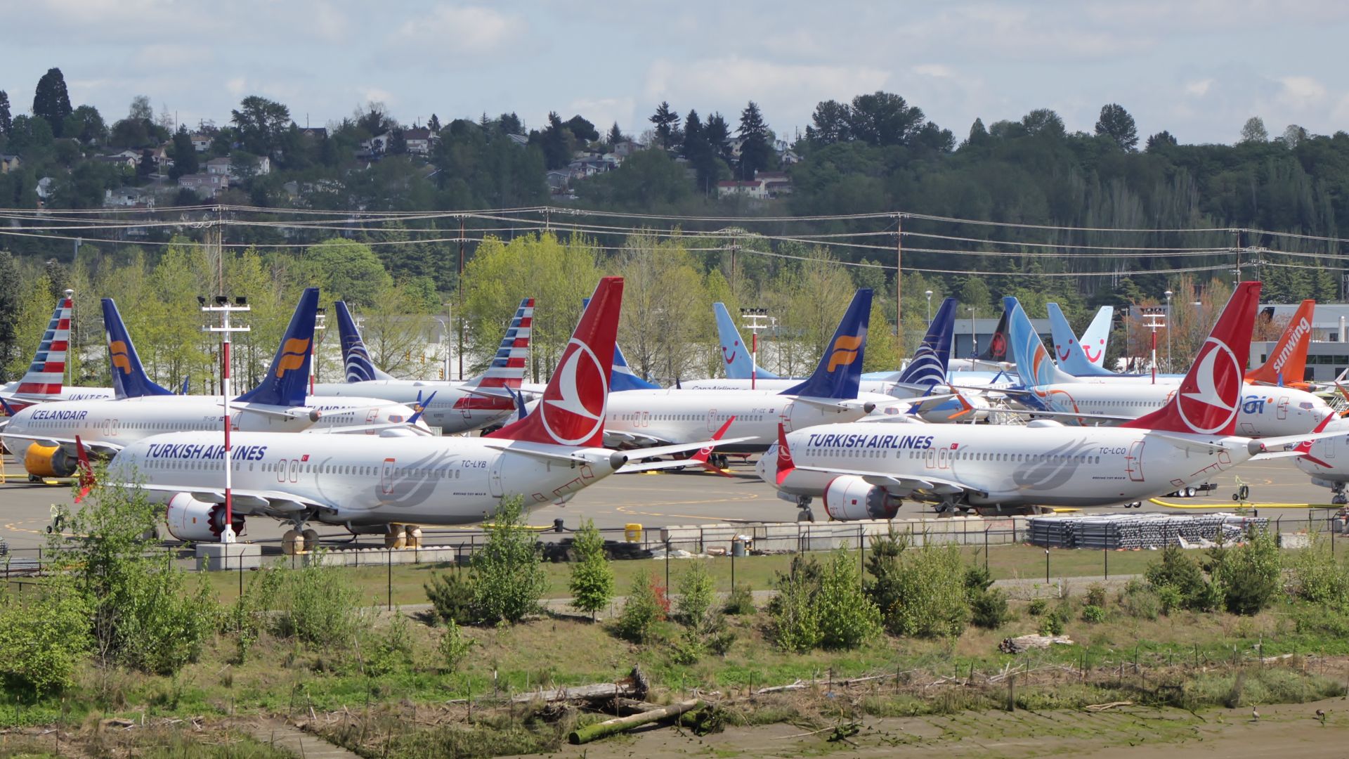 Undelivered Boeing 737 MAX aircraft that were grounded by aviation agencies, seen at parking lot at Boeing Field in Seattle, Washington. This picture was taken from the South Park Bridge.