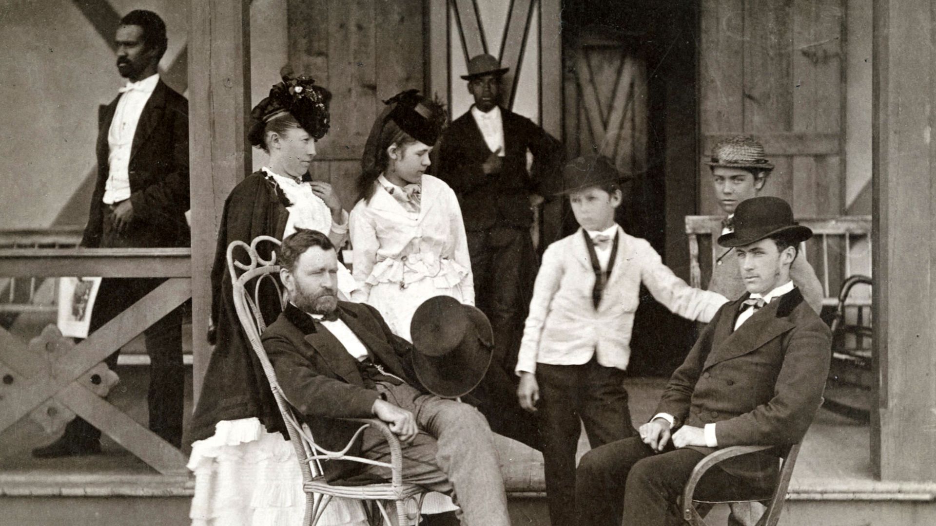 Ulysses Grant and Family at Long Branch, NJ by Pach Brothers, NY, 1870.  The Imperial Cabinet Card pictures Grant and wife, Julia Dent, and their four children; Jesse, Ulysses Jr., Nellie, and Frederick in front of their cottage. Also present are two blac