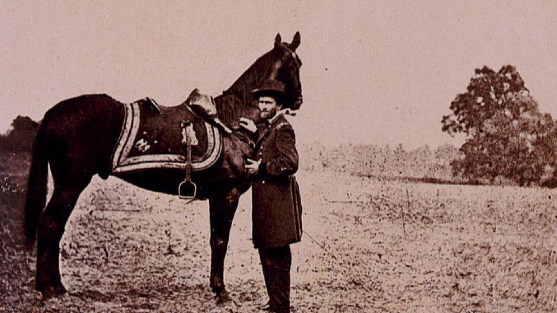 Title: Ulysses S. Grant, full-length portrait, facing left, standing alongside his war horse,