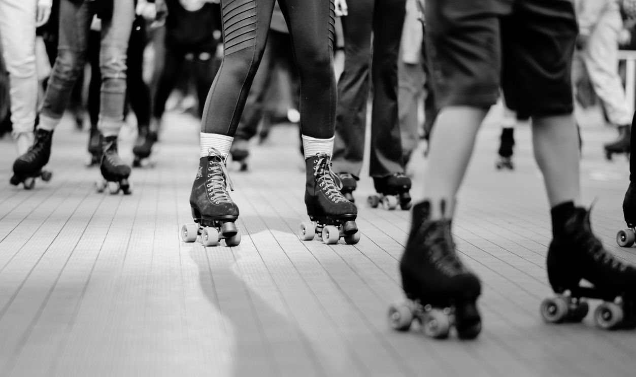 Flipper's Roller Boogie Palace Opens To The Public At Rockefeller Center NEW YORK, NEW YORK - APRIL 15: A close up on members of the public roller skating on opening day at Flipper's Roller Boogie Palace NYC at Rockefeller Center on April 15, 2022 in New York City. Rollerskating at Rockefeller Center returned this year for the first time since the 1940’s. The rink will be open until October.