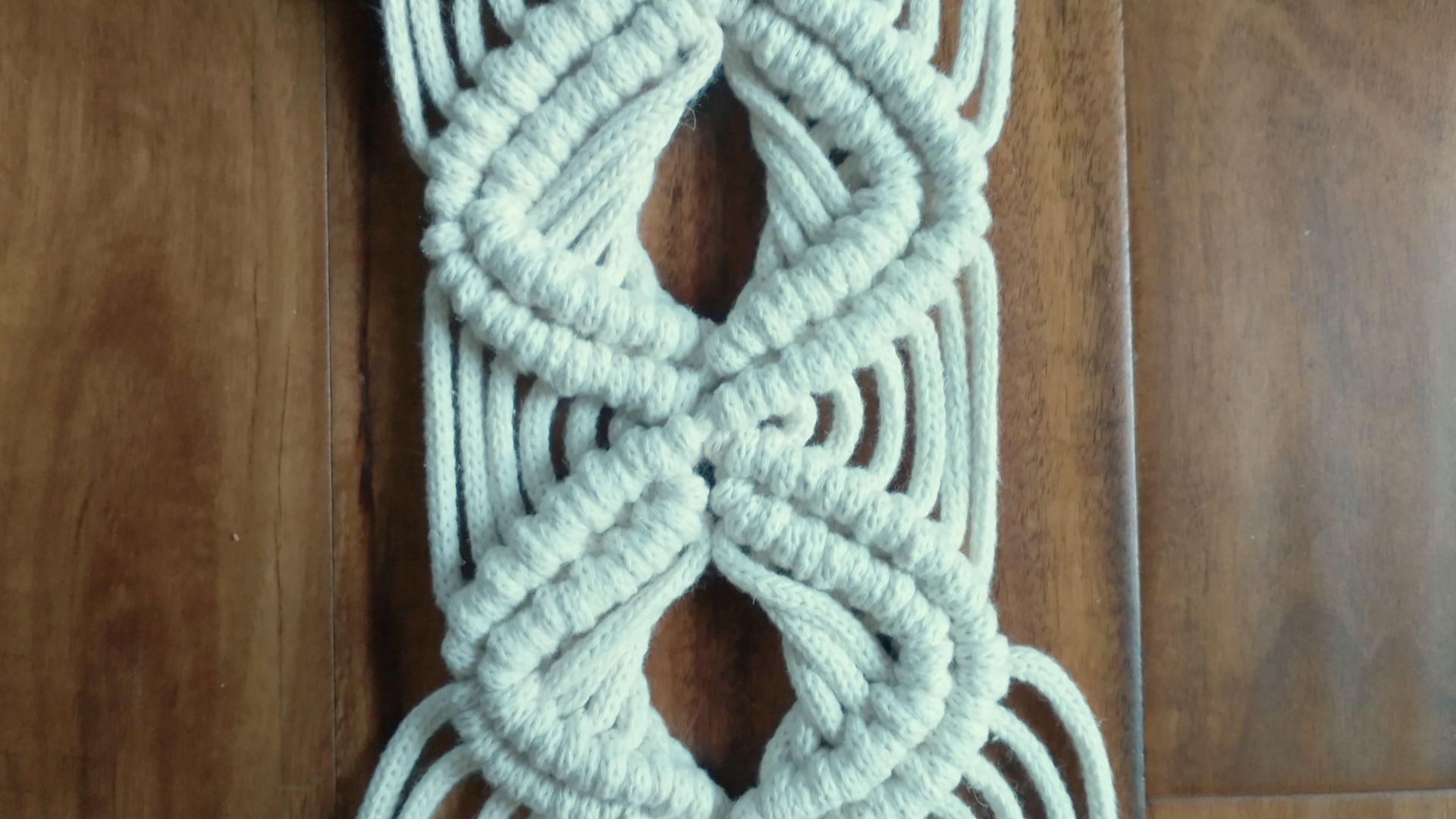 A macrame technique that implies crossing of cords
