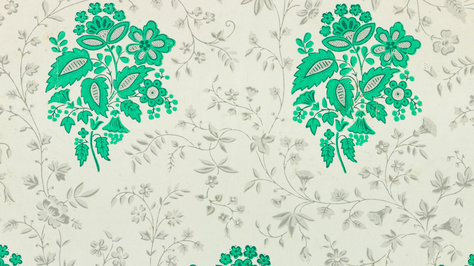 Against a glazed white ground are printed regularly spaced clusters of conventionalized blossoms and foliage in two values of green, possibly arsenic. An all-over design of serpentine vines with small blossoms and foliage in gray is printed between the gr
