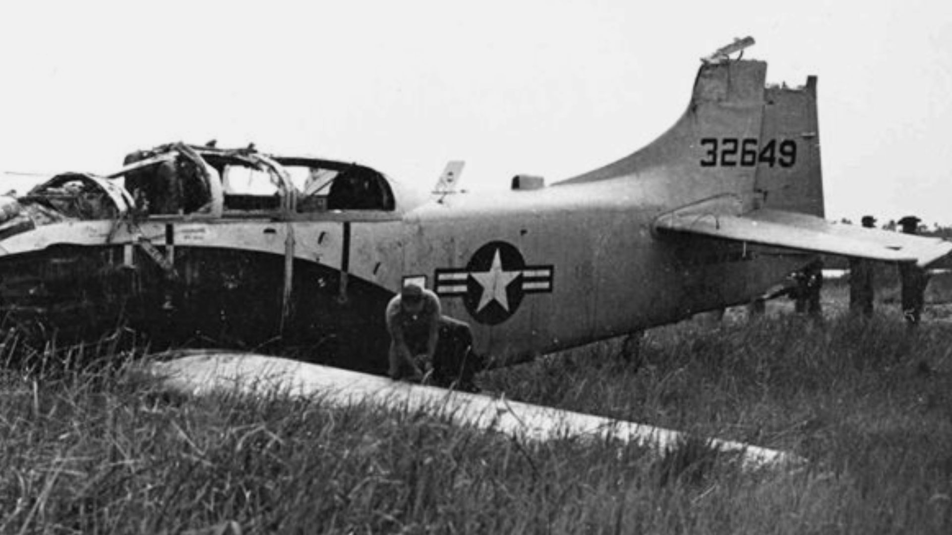 A U.S. Air Force Douglas A-1E Skyraider (s/n 52-132649) after it crash-landed near Can Tho, South Vietnam, on 21 March 1965 due to battle damage. Both crewmen were killed. The wreck was recovered and returned to service. A year later, this was the aircraf