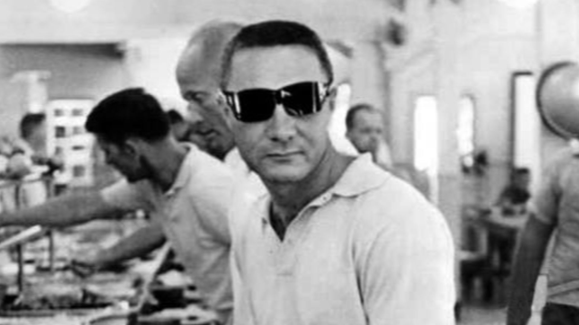 Astronaut Gus Grissom in the chow line at Grand Bahama Island on the day following his launch into space on July 21, 1961