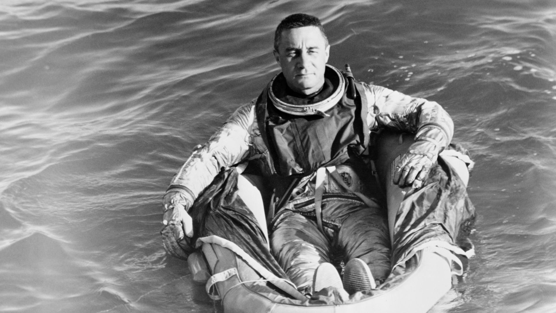 S61-04037 (1961) --- Astronaut Virgil I. (Gus) Grissom, pilot of the Mercury-Redstone 4 spaceflight, sits in a life raft during water egress training activies. Photo credit: NASA