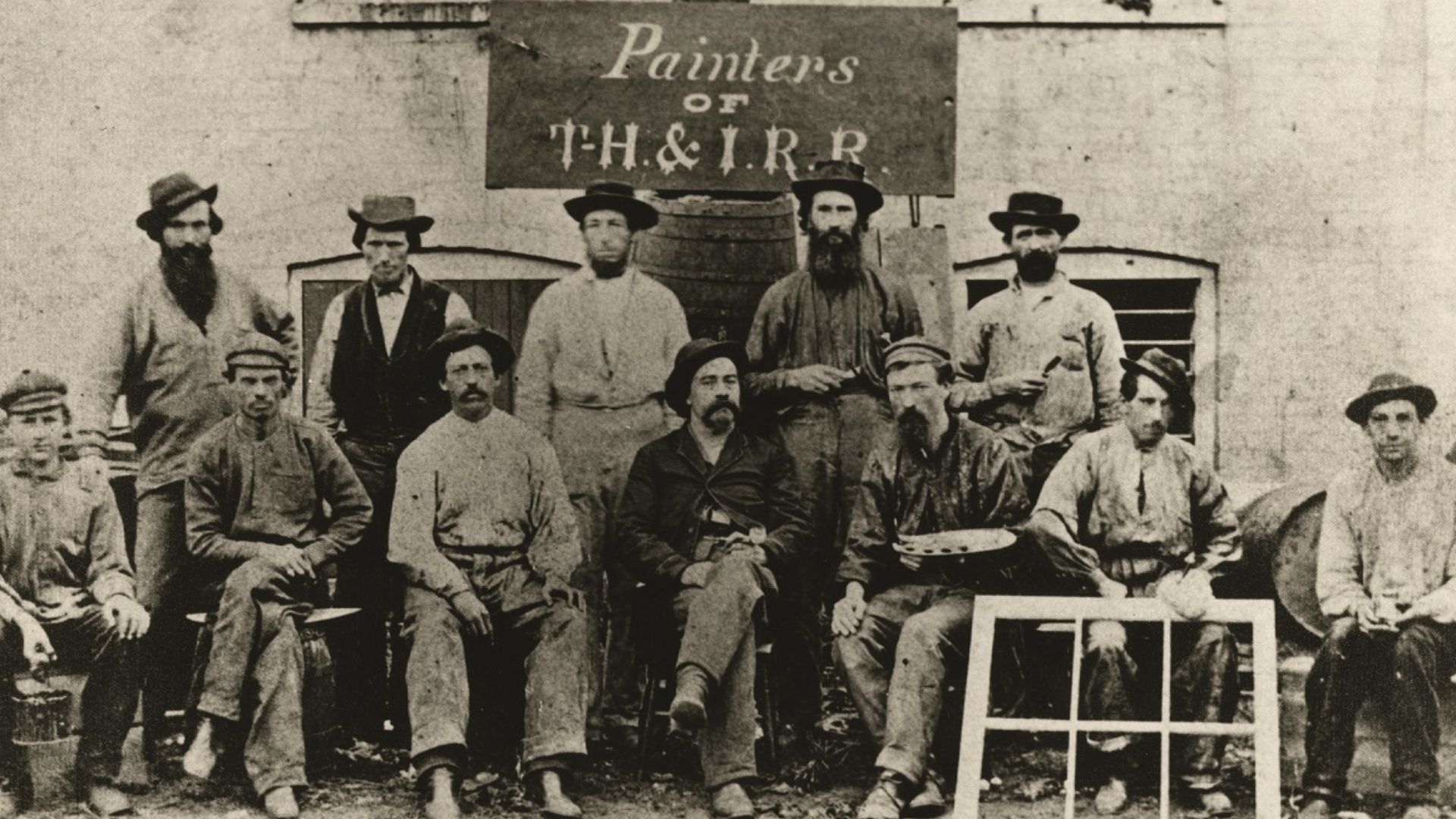 Eugene Debs (seated far left) and other painters working for the Vandalia Railroad in 1870.