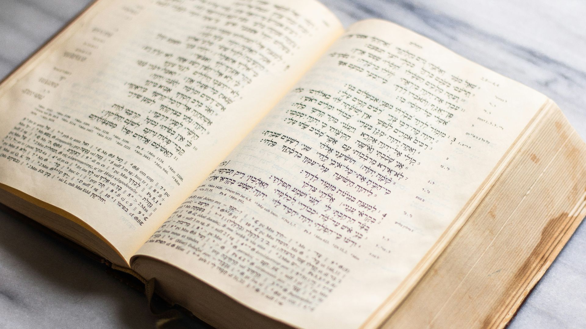 an open book sitting on top of a table