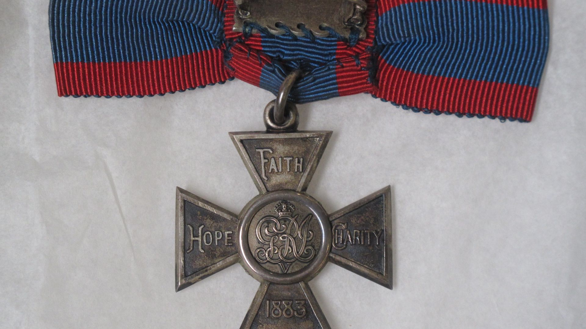 Royal Red Cross 2nd Class (ARRC) awarded to Sister Emma Bennett (French Red Cross, QAIMNSR, NZANS), WW1 silver cross, 35 mm width, plain ring suspension, with ribbon, Obverse- enamelled red, with broad silver edges around the enamel, a circular medallion 