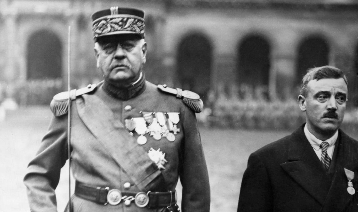 PARIS, FRANCE - DECEMBER 10: André Maginot, French War Minister, presenting the military medal to the General Prince Louis II de Monaco in the Invalides' court of honor, in Paris, France, on December 10, 1931.