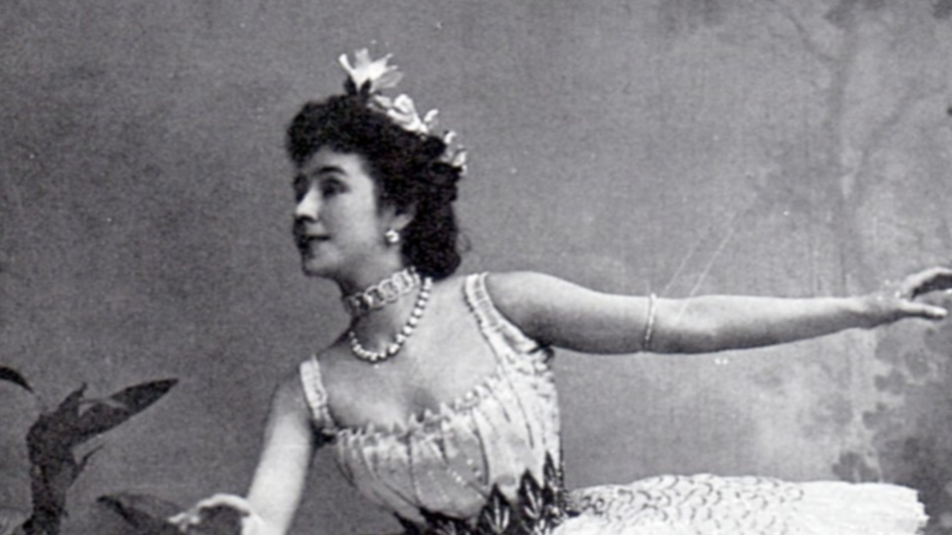 Photographic postcard of Mathilde Felixovna Kschessinskaya (1872-1971), Soloist to His Imperial Majesty and Prima ballerina of the St. Petersburg Imperial Theatres. She is costumed as Princess Aspicia in the under-water scene from the 1862 ballet The Phar