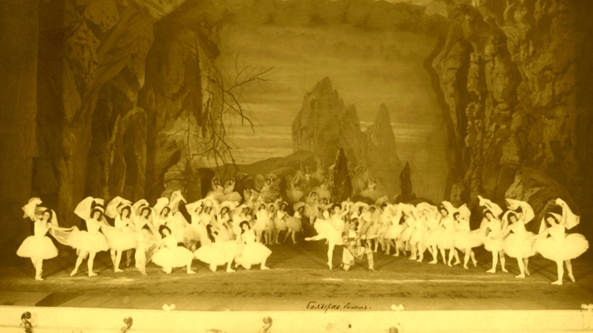 Portrait of the stage of the Imperial Mariinsky Theatre with performers in act III of the choreographer Marius Petipa's (1818-1910) final revival of his and the composer Ludwig Minkus's (1826-1917) ballet La Bayadère. In the center is the ballerina Mathil