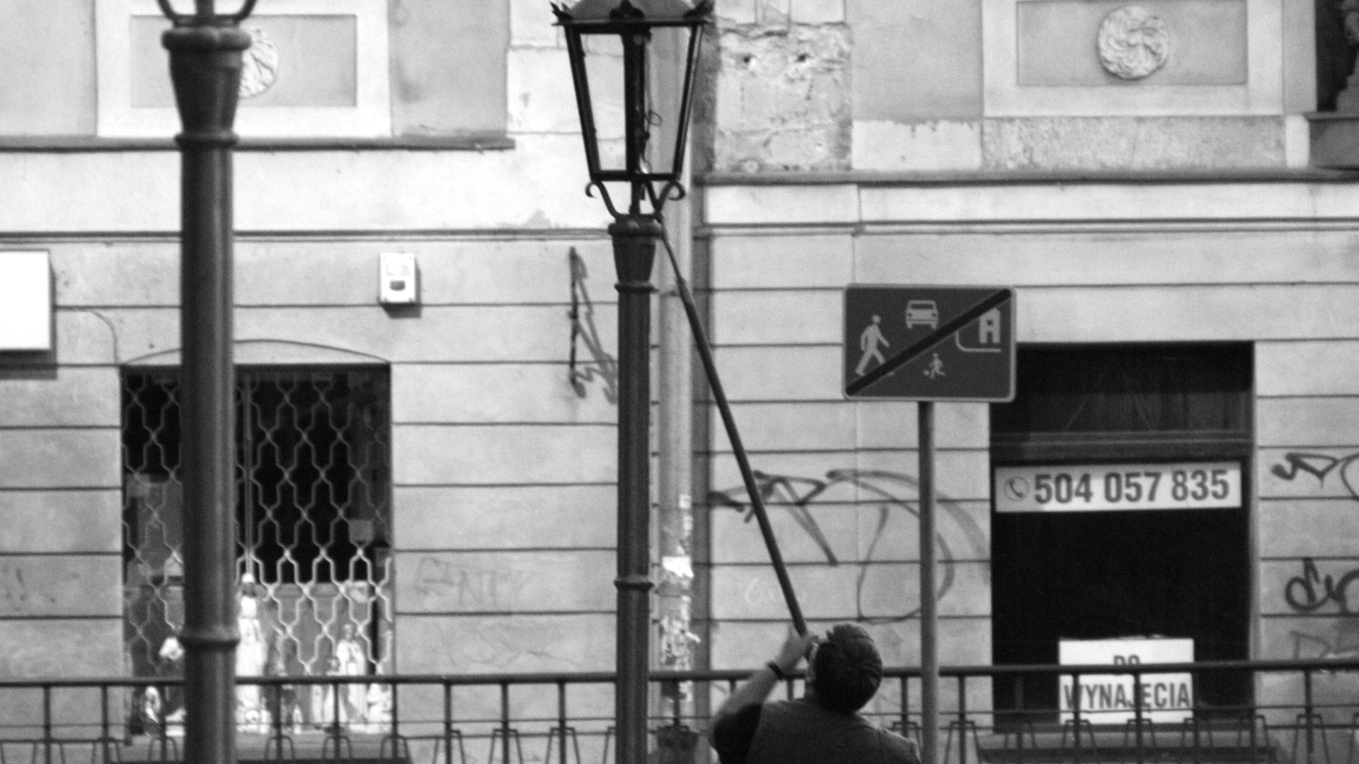 Lamplighter in Wrocław's Ostrów Tumski (