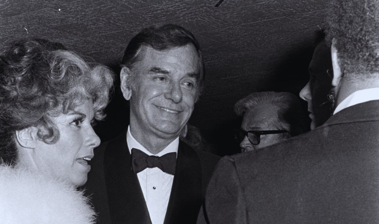 Gettyimages - 1469090490, Johnny Carson 10th Anniversary Party - 2 Oct 1972 Gig Young (C) attends a party celebrating Johnny Carson's 10th anniversary as the host of 'The Tonight Show' in Los Angeles, California, on September 30, 1972.