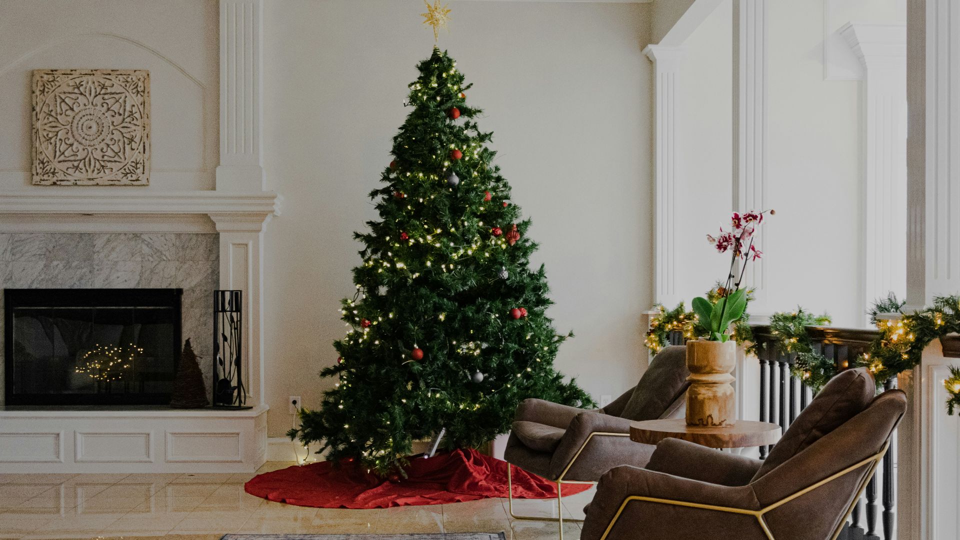green christmas tree with baubles and string lights