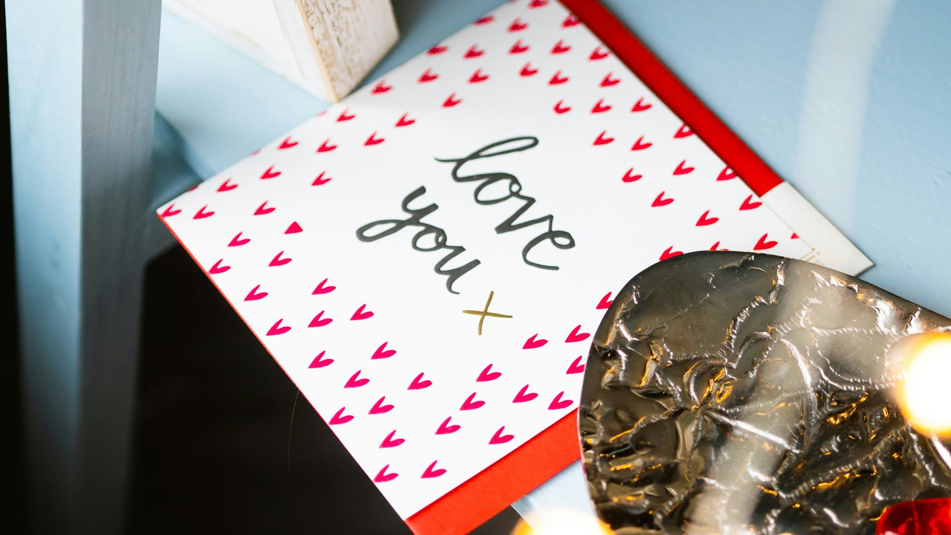 happy birthday greeting card on white wooden table