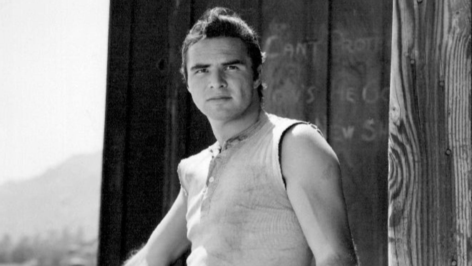 Publicity photo of Burt Reynolds as blacksmith Quint Asper from the television program Gunsmoke.