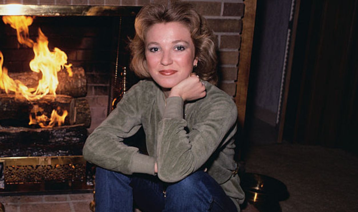 Country Music Star Tanya Tucker Seated by Fireplace