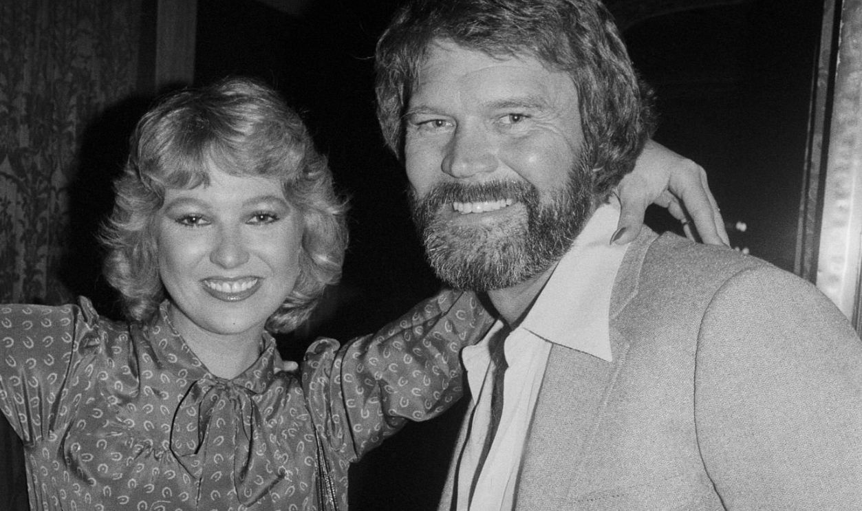 Glen Campbell with Tanya Tucker; circa 1970; New York. 