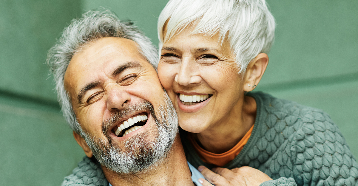 a happy older couple embracing