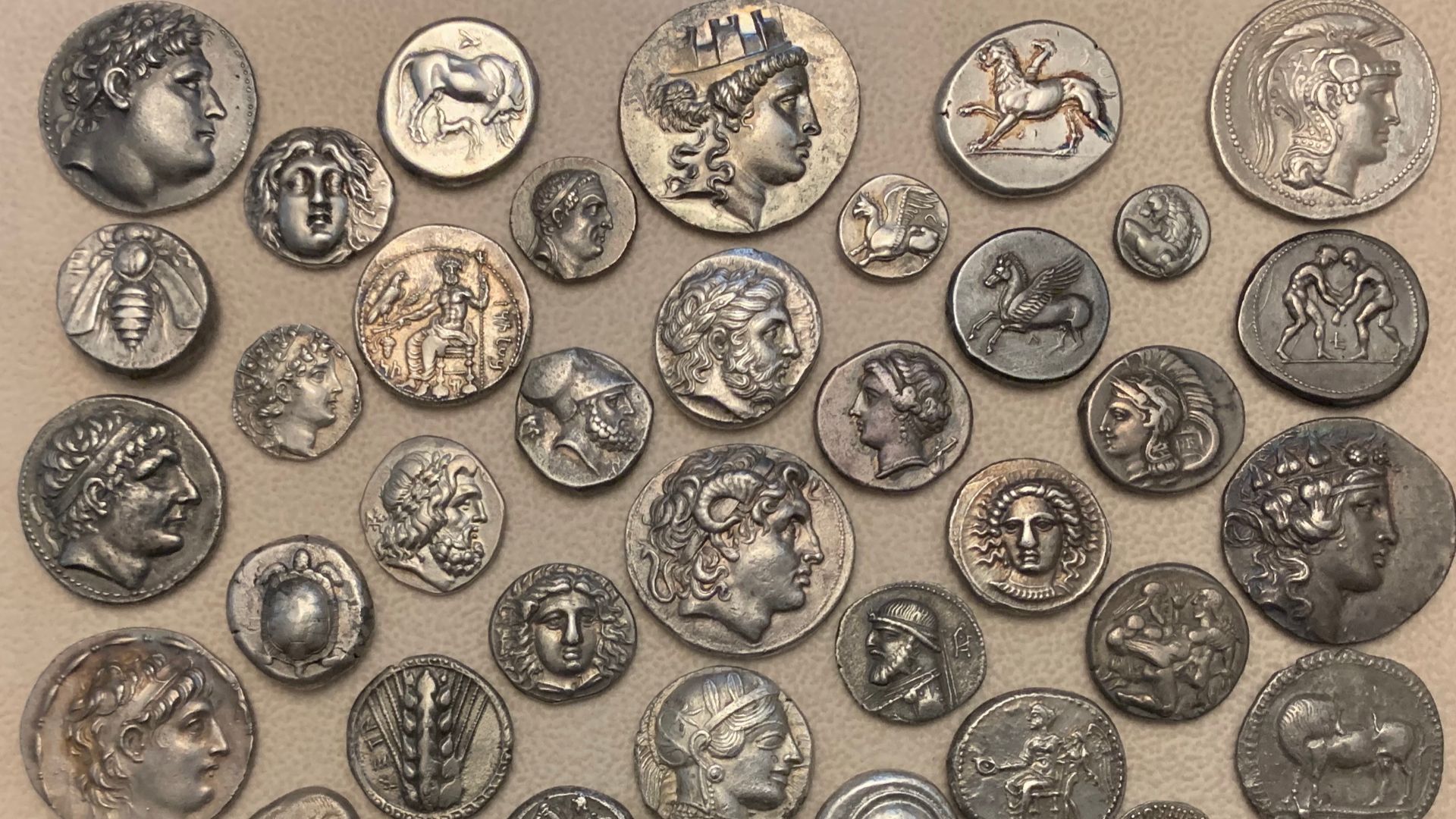 Different silver denominations (drachm, nomos, stater, didrachm, tetradrachm) from different ancient Greek city-states.