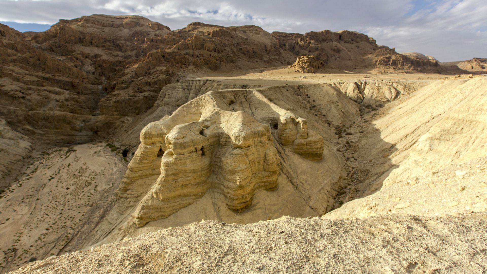 The Dead Sea Scrolls are a collection of 972 texts discovered between 1946 and 1956 that consist of biblical manuscripts from what is now known as the Hebrew Bible and extra-biblical documents found on the northwest shore of the Dead Sea, from which they 