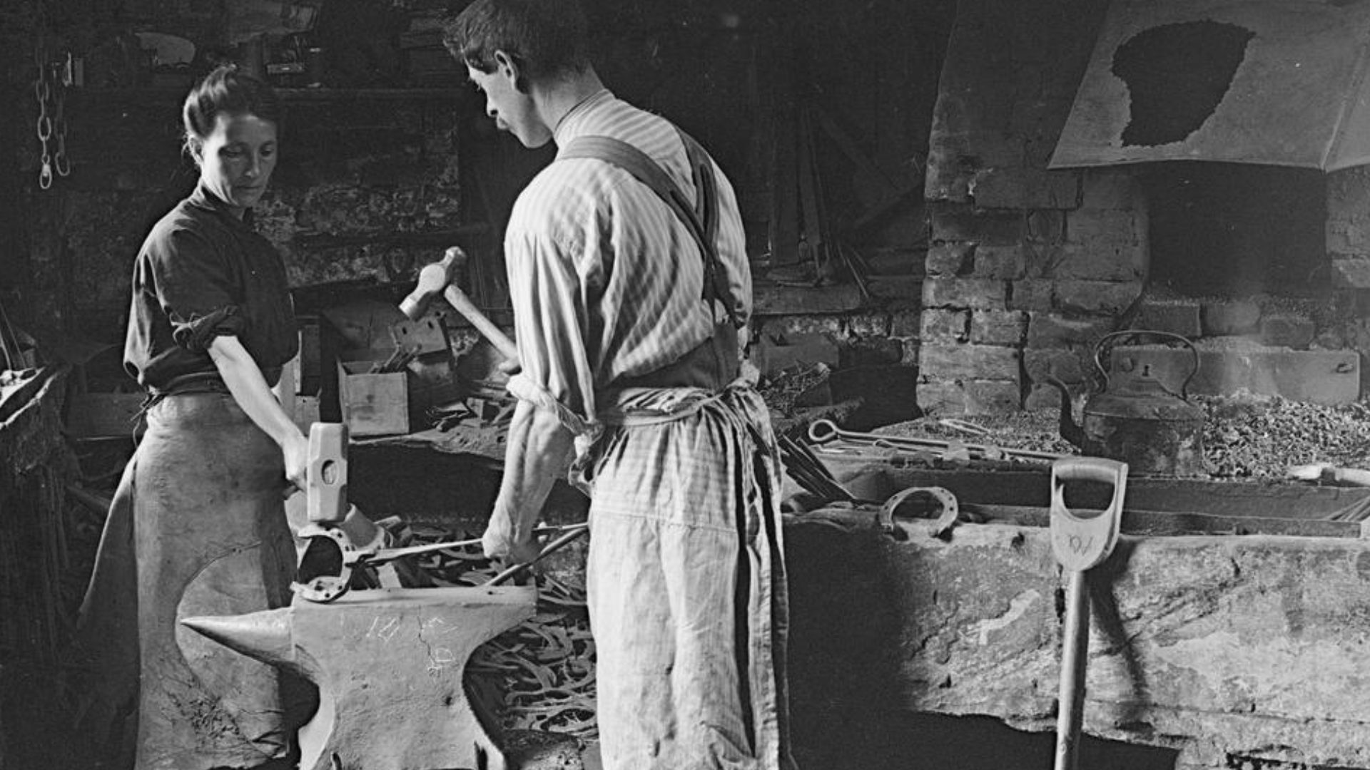The Employment of Women in Britain, 1914-1918
A wife helping her blacksmith husband in his forge.