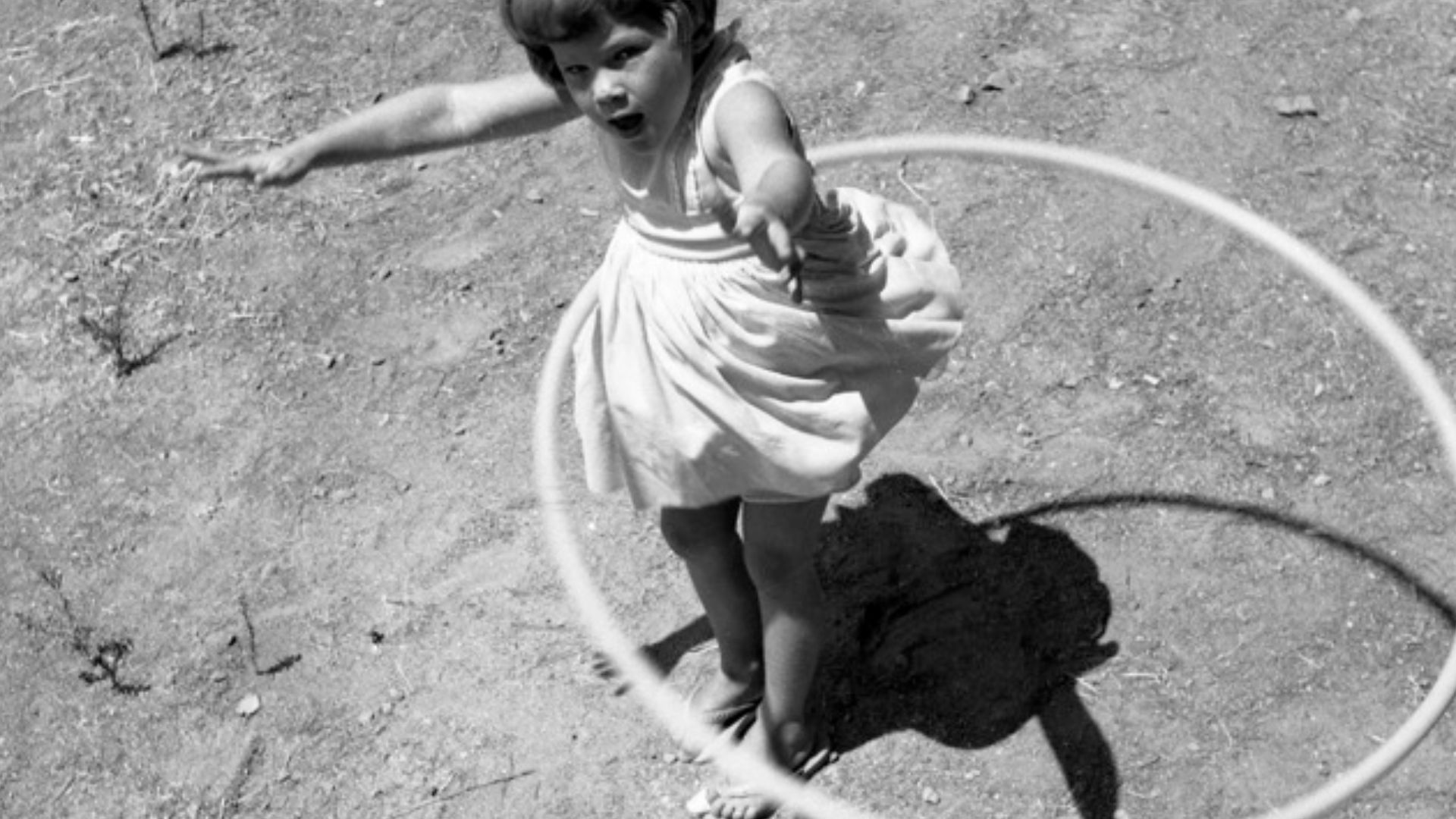 Girl twirling a Hula hoop, 1958
Other information

Photo by George Garrigues.