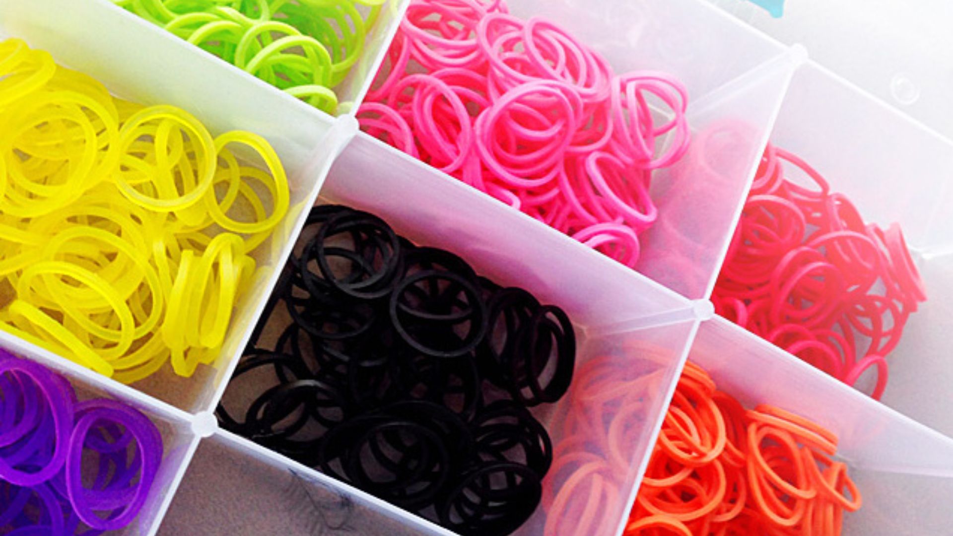 Multicolored rubberbands used with a Rainbow Loom