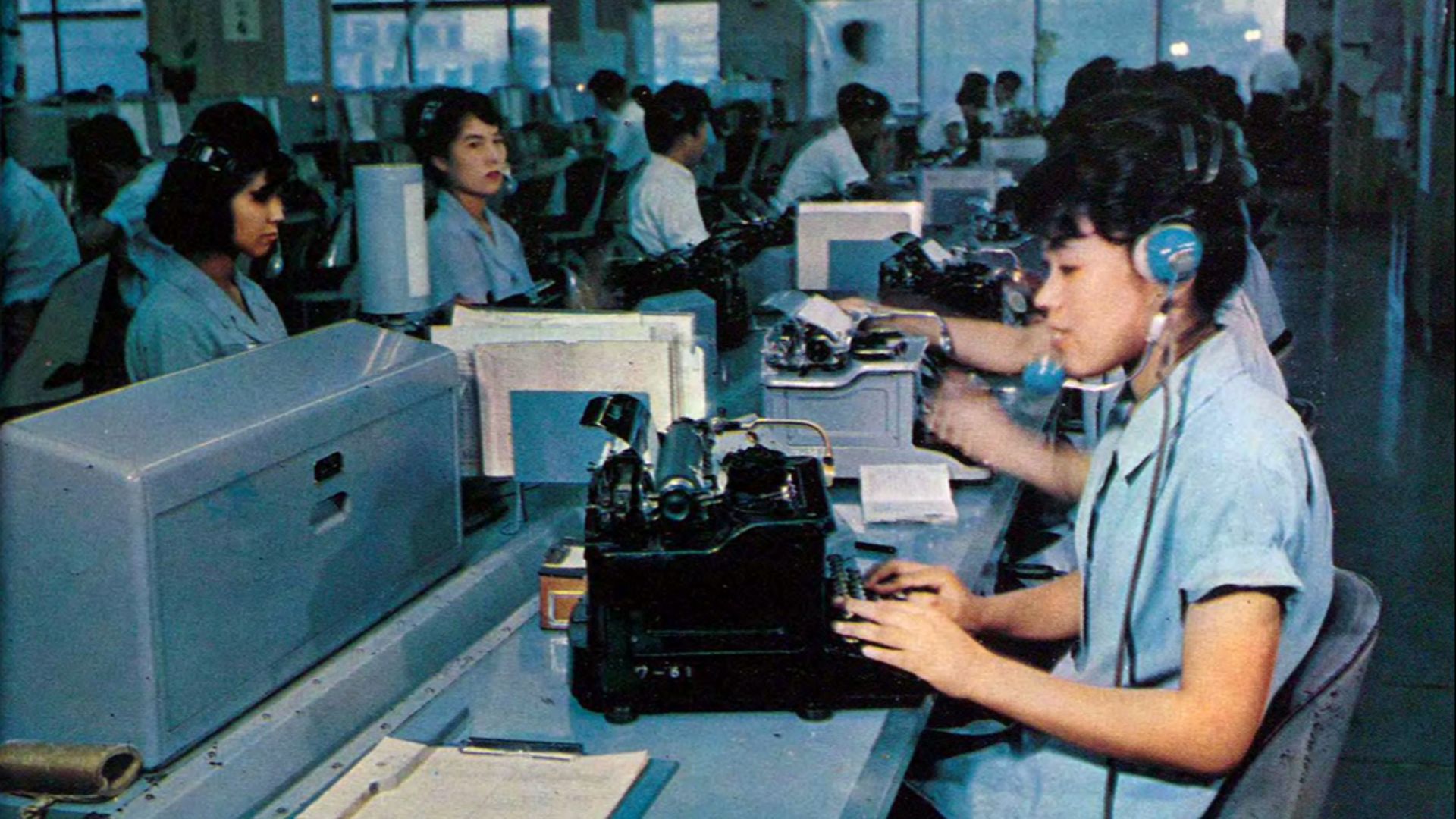 Operators sending telegrams in Tokyo Central Telegraph Office.