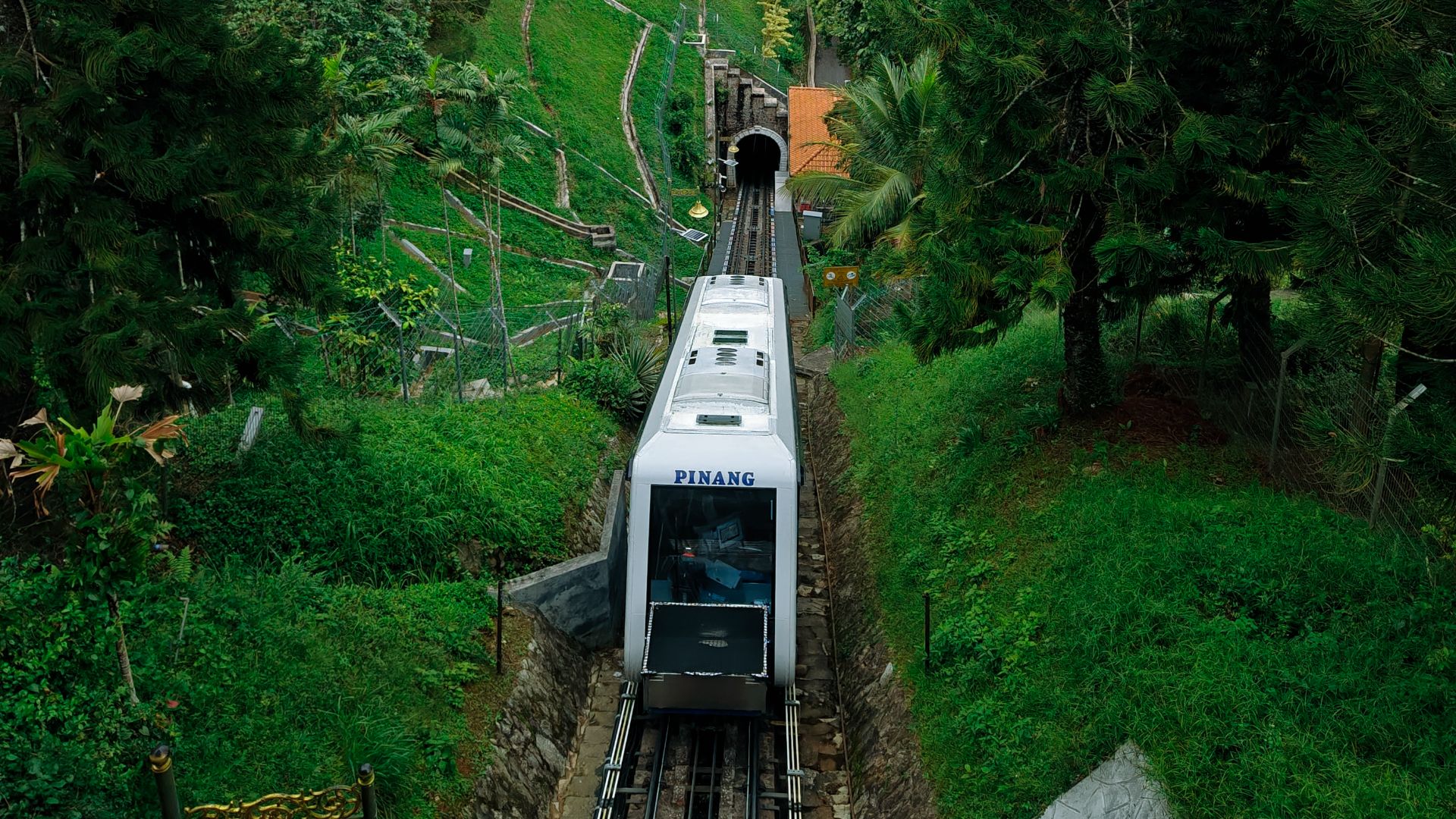 A funicular tram ascending Penang Hill in June 2023